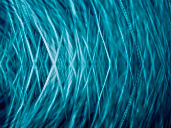 Flowing blue lines symbolizing energy and vigor through daily practice